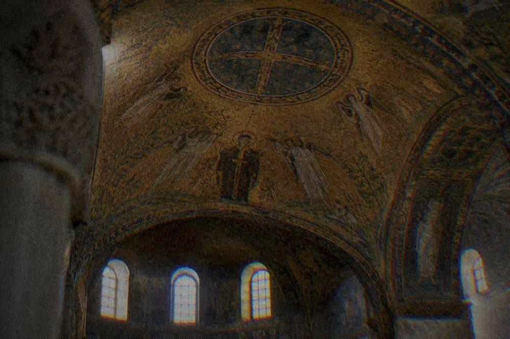 A mosaic ceiling of gold-ground glass tesserae inside one of Ravenna's early Christian monuments
