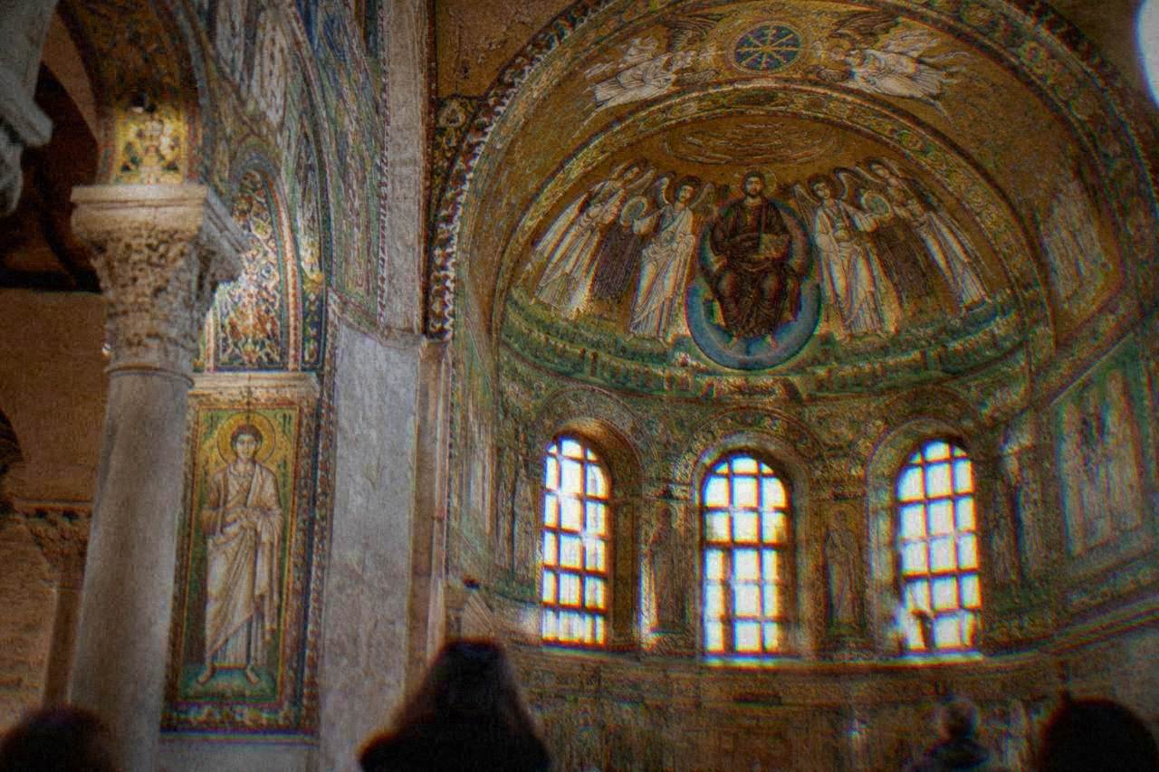 Golden Byzantine mosaics covering the interior of an ancient Ravenna church