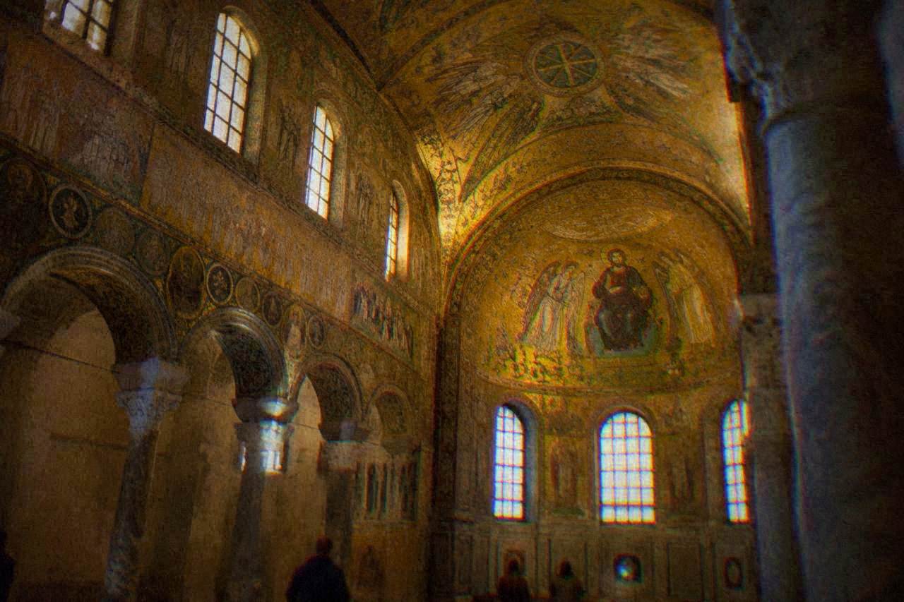 Gold Byzantine mosaic ceiling inside an ancient Ravenna monument