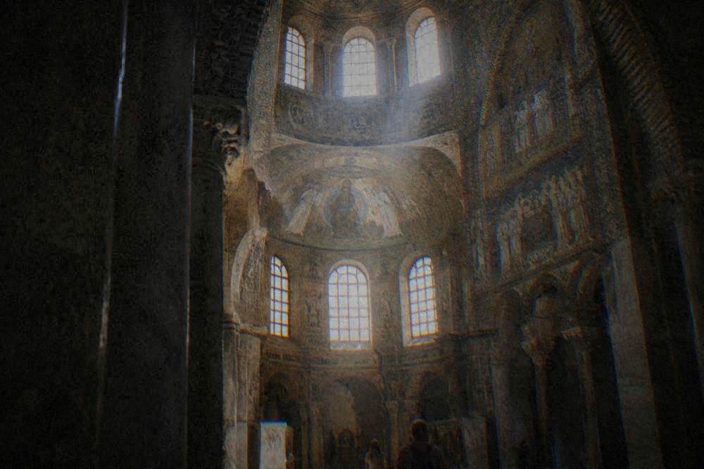 Sunlight entering the octagonal clerestory of San Vitale above the mosaic panels