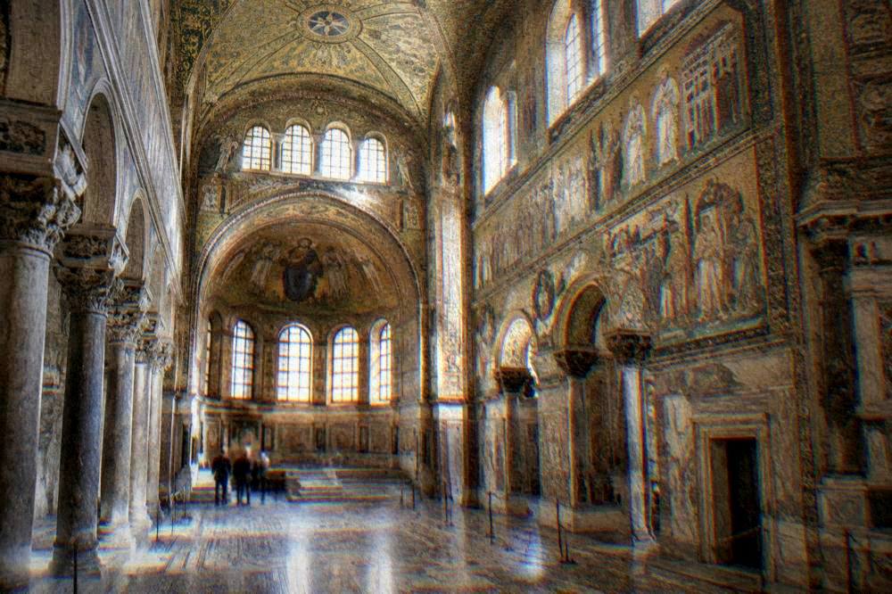 Interior of a Byzantine basilica with golden mosaic decoration on walls and vaults