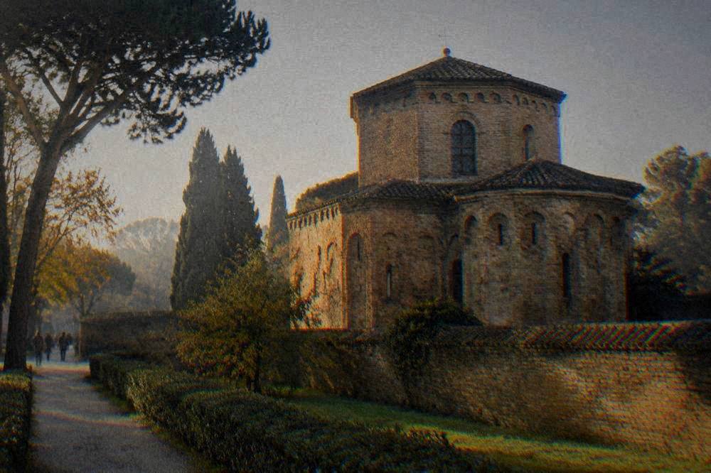 Autumn light on the brick facade and garden wall of the mausoleum in Ravenna