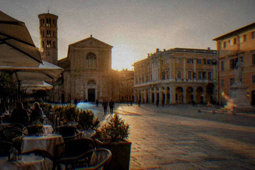 Piazza del Popolo in Ravenna with its civic buildings and outdoor cafe tables