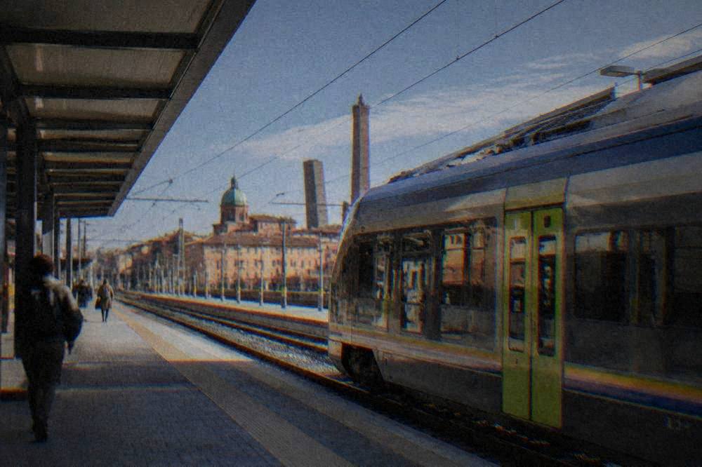 A regional train at a station platform in Emilia-Romagna