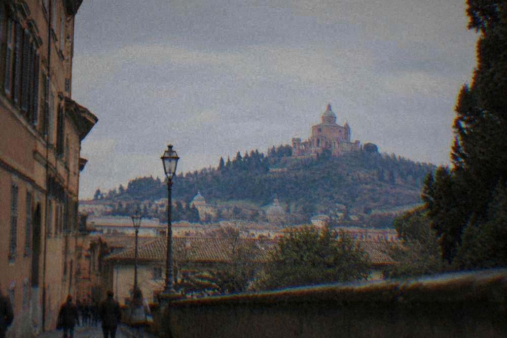 Basilica of San Luca on a hill above Bologna seen from the city