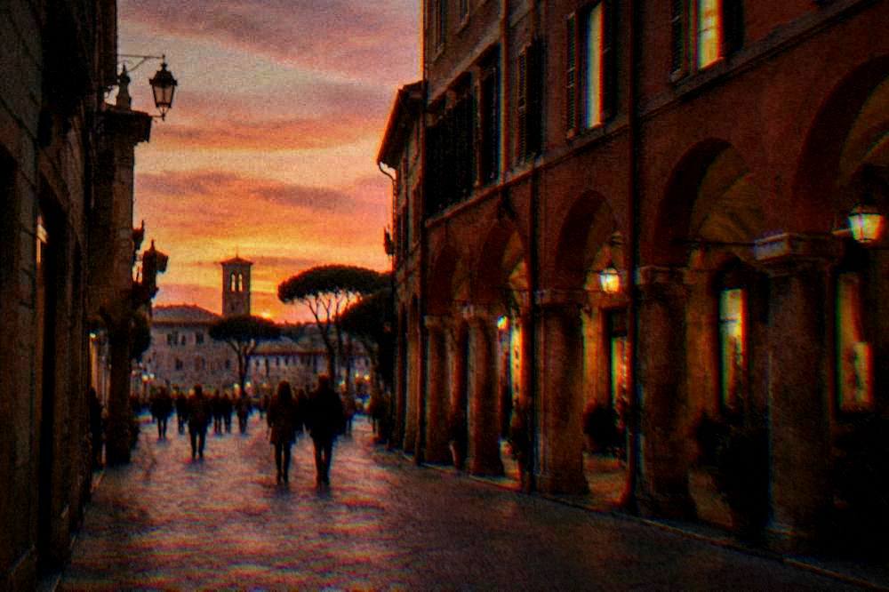 Evening light on brick arcades and café tables in a small Romagna town