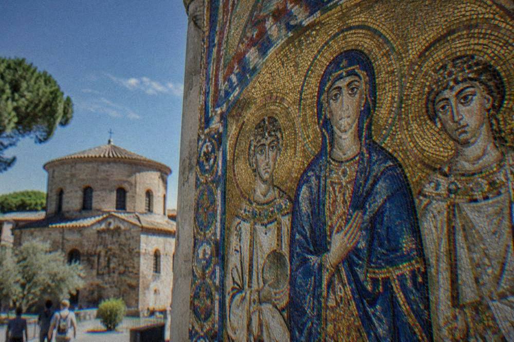 Detail of a Byzantine mosaic showing figures in gold and blue glass tesserae