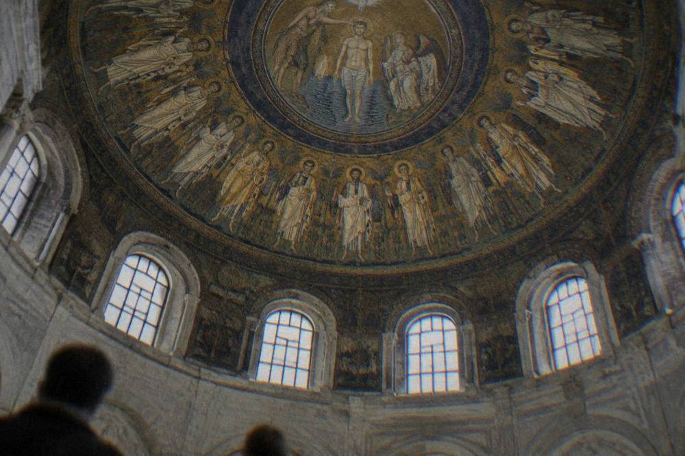 Ceiling dome mosaic of the baptism of Christ with a ring of apostles in gold and blue