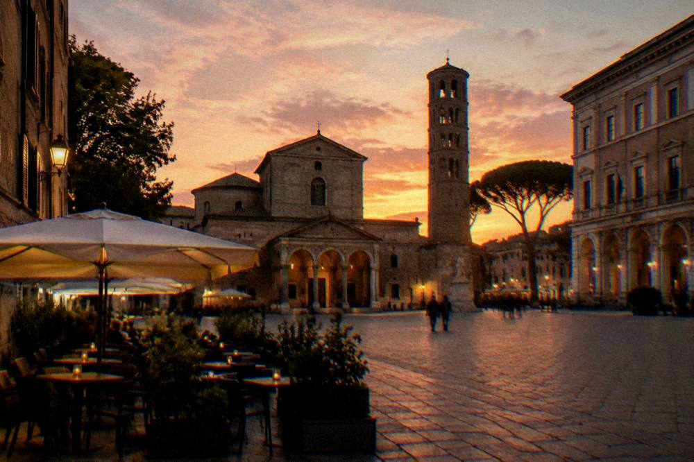Piazza del Popolo in Ravenna with its civic buildings and cafe tables under evening lights