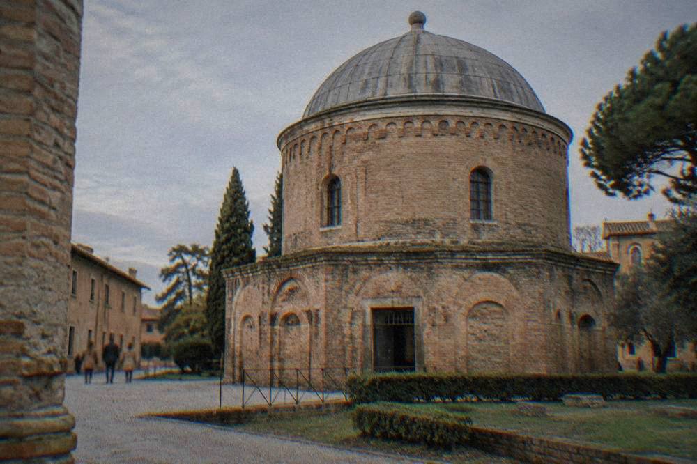 The brick drum and monolithic dome of an ancient mausoleum in Ravenna