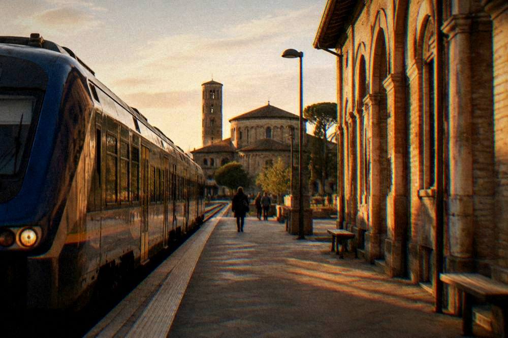 A regional train at a station platform in Emilia-Romagna