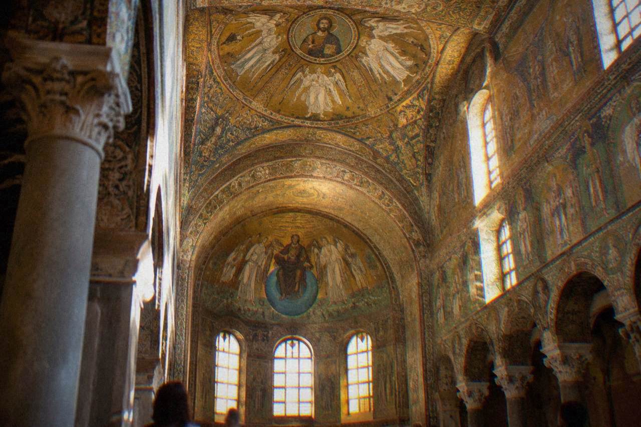 Gold Byzantine mosaic ceiling inside an ancient Ravenna church