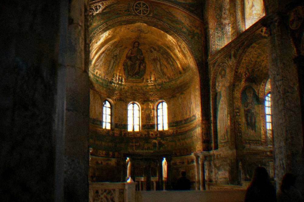 Evening light on the arcades and cafés of Piazza del Popolo in Ravenna